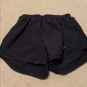 All back Nike running shorts